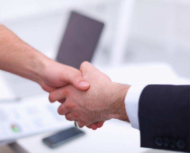 Businessmen shaking hands, isolated on white. - Fotó, kép