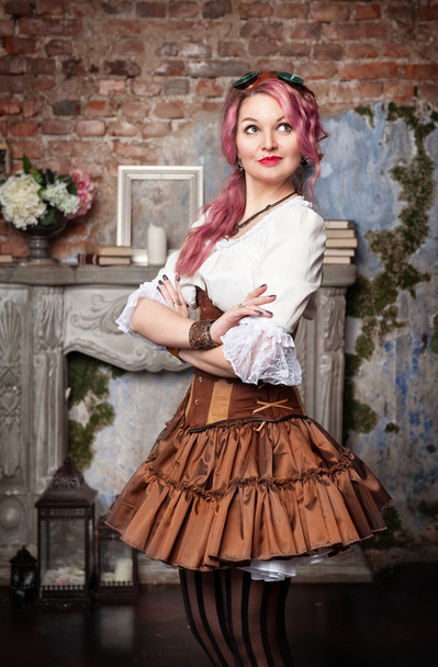Beautiful steampunk woman posing - Photo, Image