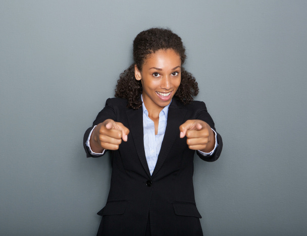 Confident business woman pointing finger - Photo, Image