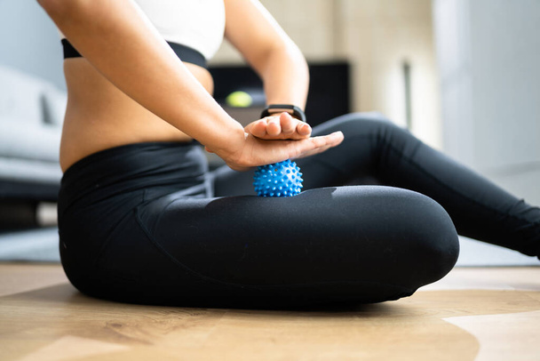 Leg Massage With Trigger Point Spiky Massage Ball. Myofascial Release - Фото, изображение