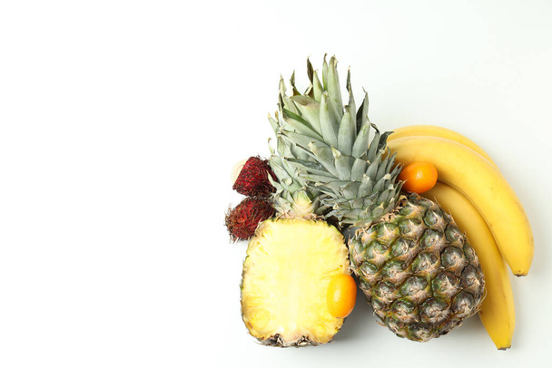 Exotic fruits on white background, space for text. - Photo, Image
