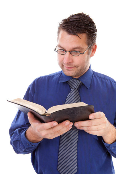Male nerdy geek is reading a book - Foto, Imagem