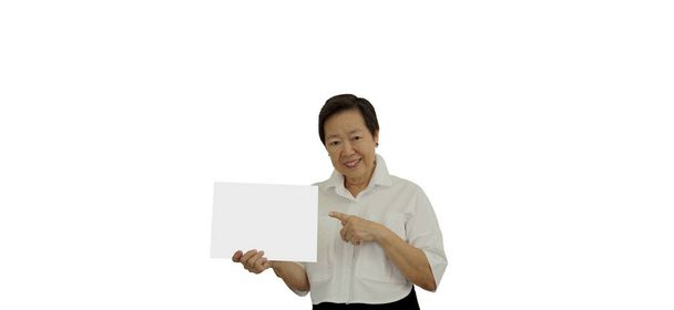 Asian senior elder woman holding white blank sign for advertising copy space positive smile isolated background - Photo, Image