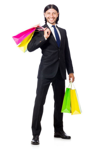 Man with shopping bags isolated on white - Foto, imagen