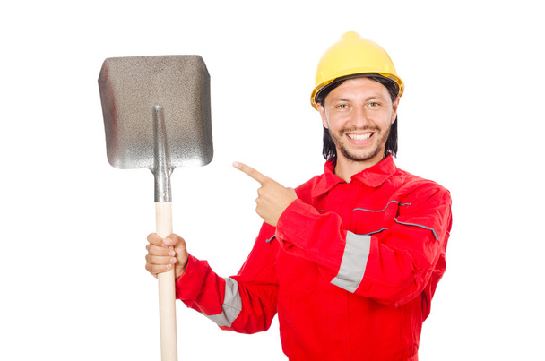 Man in red coveralls with spade - Foto, imagen