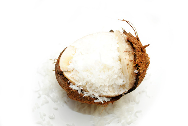 nefunkční kokos s strouhaným kokosem rozlévají - Fotografie, Obrázek