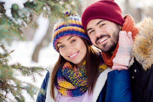 Photo of young cheerful attractive couple happy positive smile forest husband wife love romantic winter - Valokuva, kuva