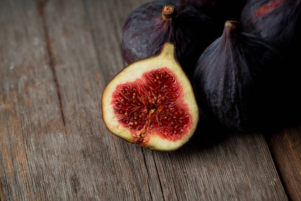 Freshly harvested ripe fig on the colorful background. Selective focus. Shallow depth of field. - Фото, изображение