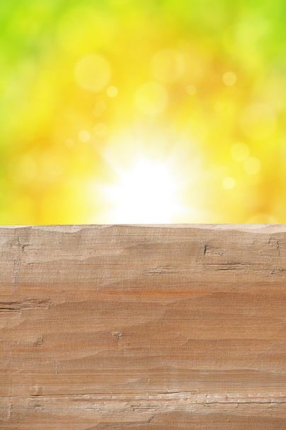 Mesa de madeira rústica vazia com fundo abstrato de verão
 - Foto, Imagem