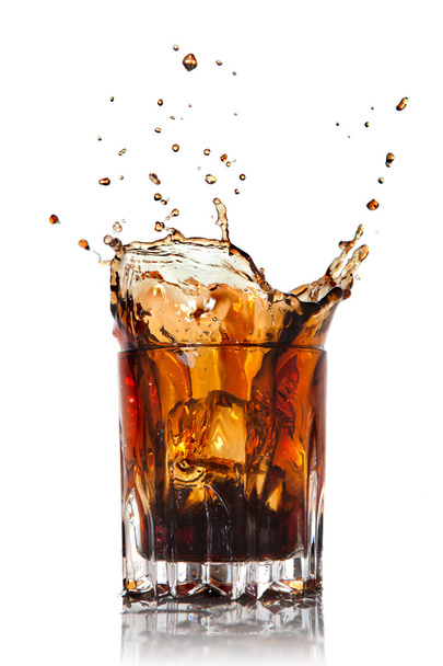 Splash of cola in glass isolated on white - Fotoğraf, Görsel