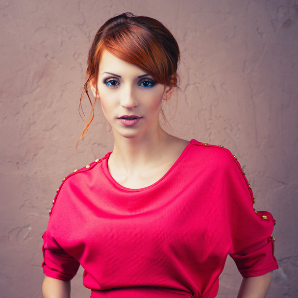 fashionable woman posing in red dress - Photo, image