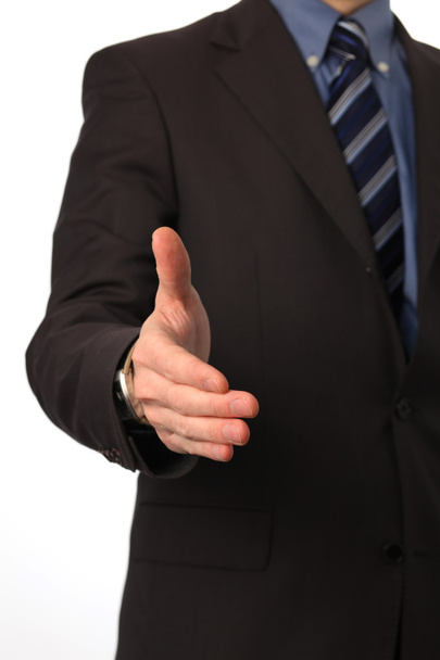 Бизнесмен предлагает за рукопожатие
 - Фото, изображение