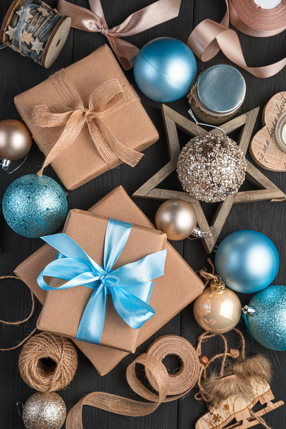 New Years background with gifts and toys in beige and blue. - Photo, Image
