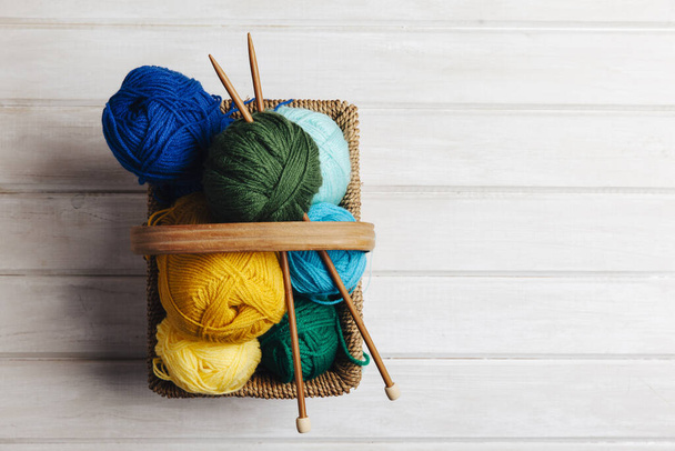 top view wool balls basket. High quality beautiful photo concept - 写真・画像
