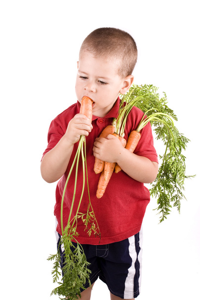 Boy and carrot - Photo, Image