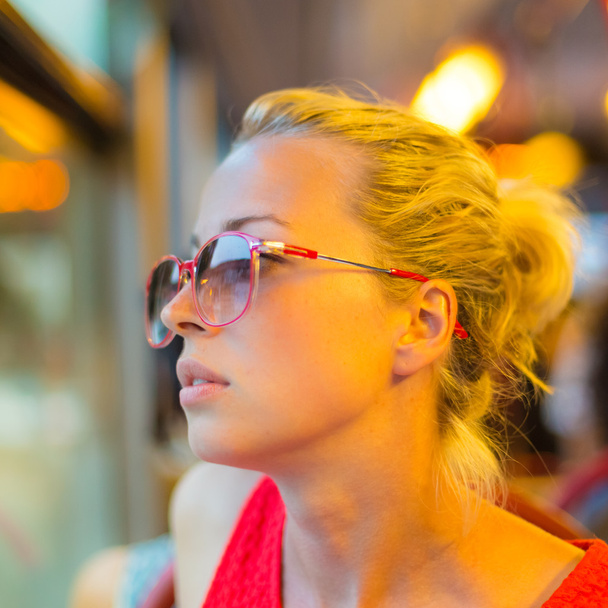 Woman looking out trams window. - Photo, Image