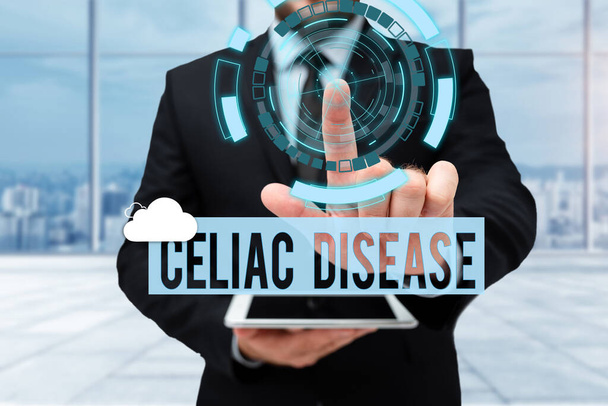 手書きサイン｜Celiac Disease.ビジネスは主に均一な立ち位置のタブレットの小さい腸の人に影響を与える自己免疫疾患を示す未来的な技術をタイプする. - 写真・画像