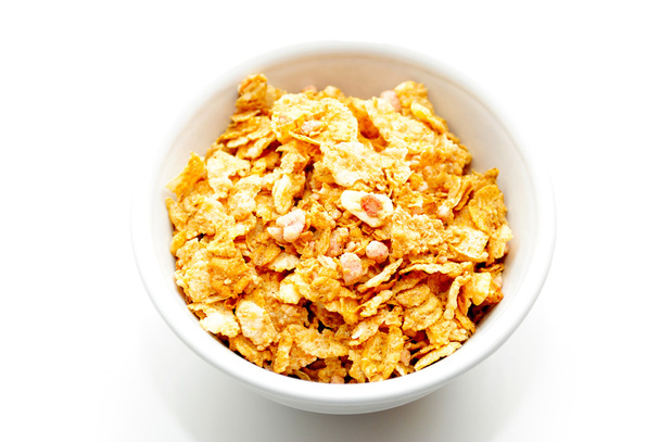 Cereales saludables de yogur hechos de copos de maíz y avena
 - Foto, imagen