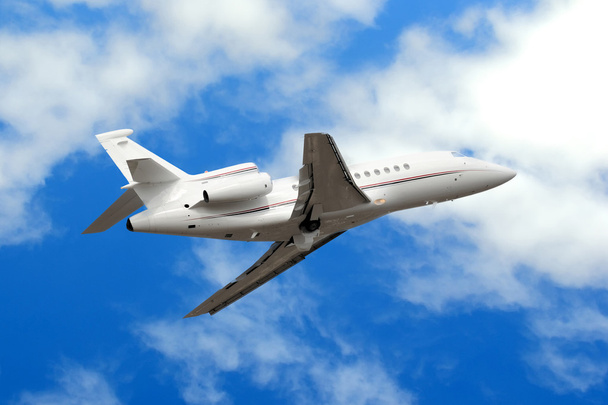 jet de negocios en las nubes
 - Foto, Imagen