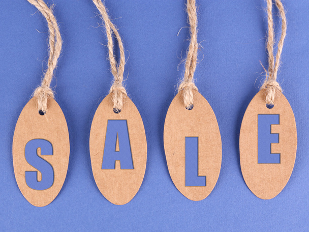Sale tags on blue background - Photo, Image