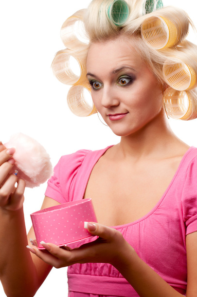 Blonde woman with rollers - 写真・画像