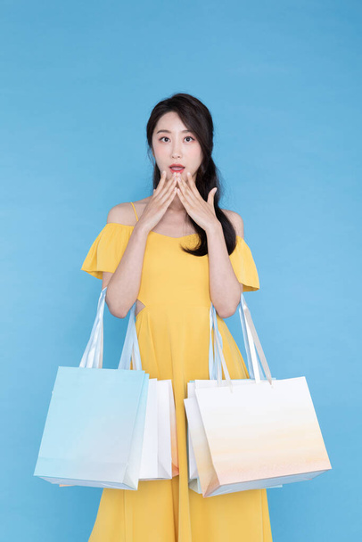 shopping event concept, beautiful Korean Asian woman with shopping bag - 写真・画像