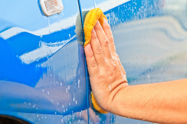 wash a car - 写真・画像
