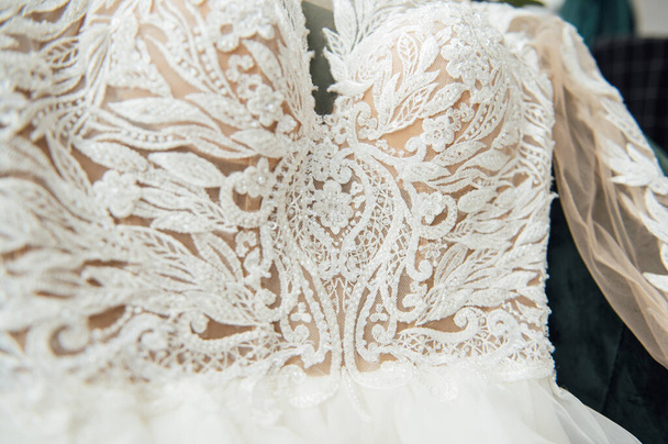 beautiful fashionable stylish expensive luxury wedding dress, closeup details - Fotoğraf, Görsel