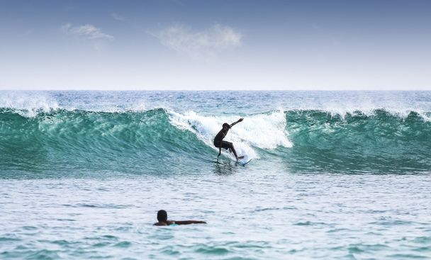 Silhouettes de surfeurs
. - Photo, image