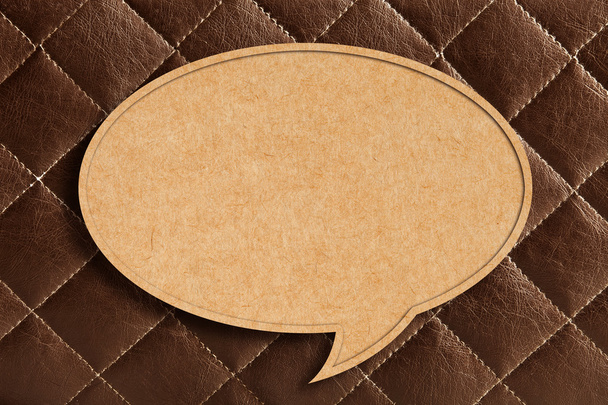 Blank Speech Bubble on Brown leather Background - Foto, afbeelding