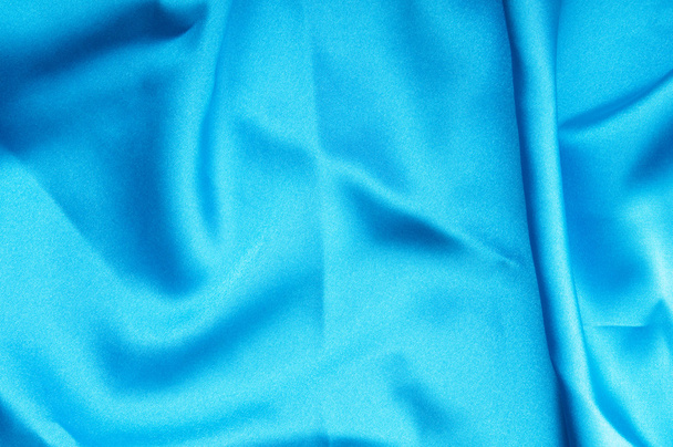 Bright satin fabric folded to be used as background - Photo, Image