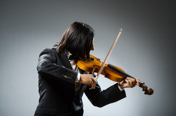 音楽的概念における男性バイオリン奏者 - 写真・画像