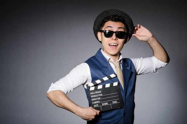 Funny man with movie clapper - Photo, Image