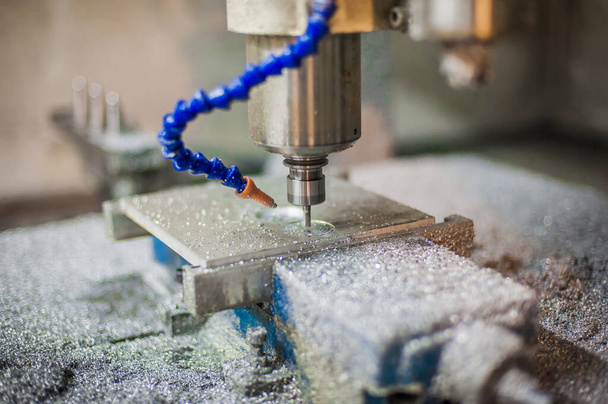 Close-up detail view of CNC milling metal engraving machine in factory workshop - Φωτογραφία, εικόνα