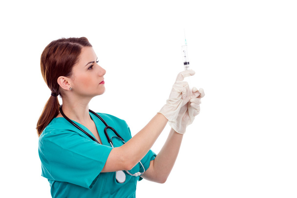 Beautiful female doctor preparing  syringe - Photo, Image
