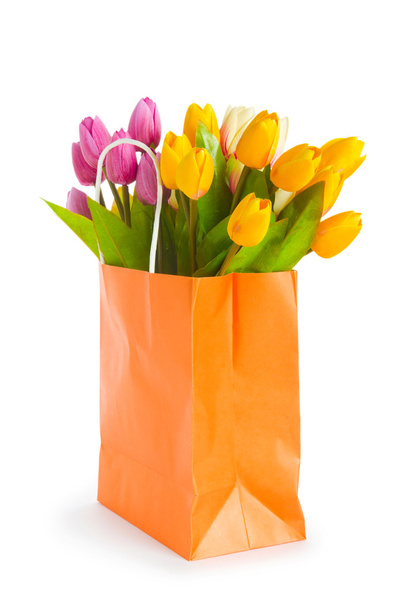 Tulips in shopping bag isolated on white - Φωτογραφία, εικόνα