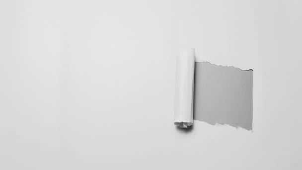 Stop Motion Fotografie Konzept. Diagonal zerrissenes Papier in schwarz-weiß. - Filmmaterial, Video