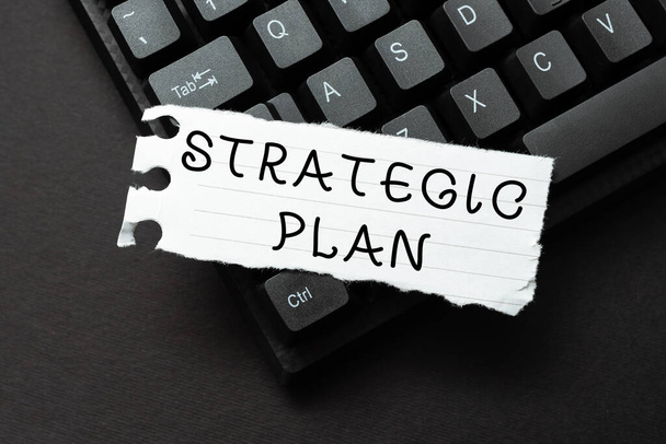 Sign displaying Strategic Plan. Business overview A process of defining strategy and making decisions Sending New Messages Online, Creating Visual Novels, Typing Short Stories - Photo, Image