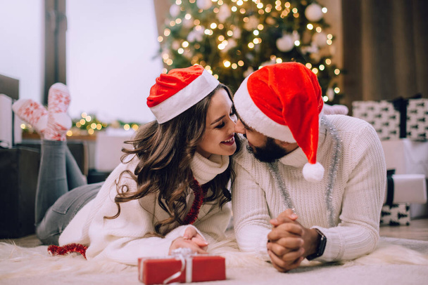 loving couple celebrates Christmas. - Fotografie, Obrázek