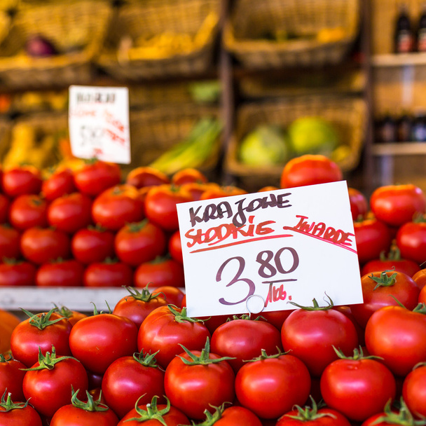 Fresh tomatoes in a market stall in Poland.  - Photo, Image