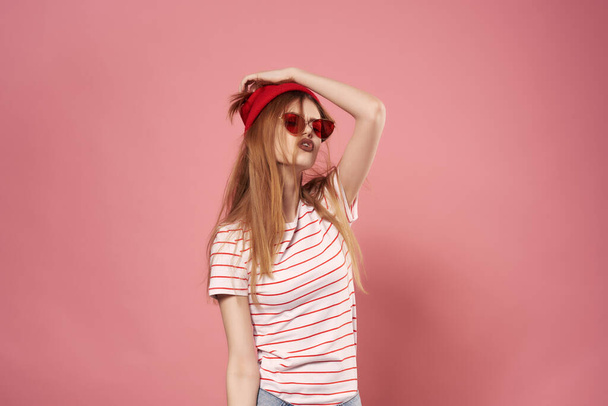 woman in striped t-shirt red hat fashionable clothes modern style fun - 写真・画像