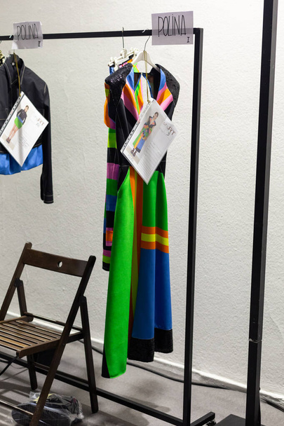 MILAN, ITALY - SEPTEMBER 25: Clothes racks in the backstage before Aquilano Rimondi show during Milan Women's Fashion Week on SEPTEMBER 25, 2021 in Milan - Фото, изображение