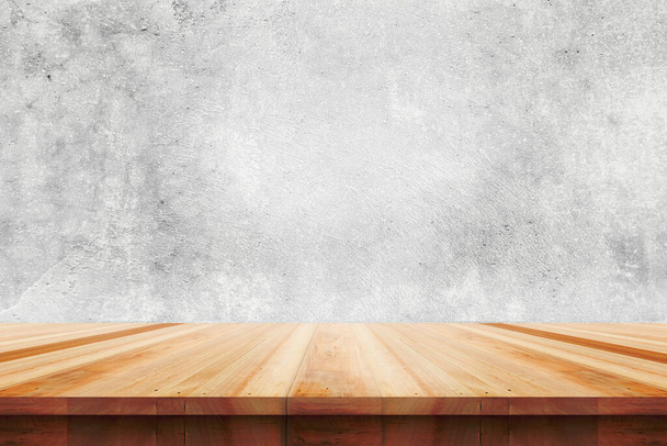 Wood table top on bare concrete wall background - can be used for display or montage your products - Foto, immagini