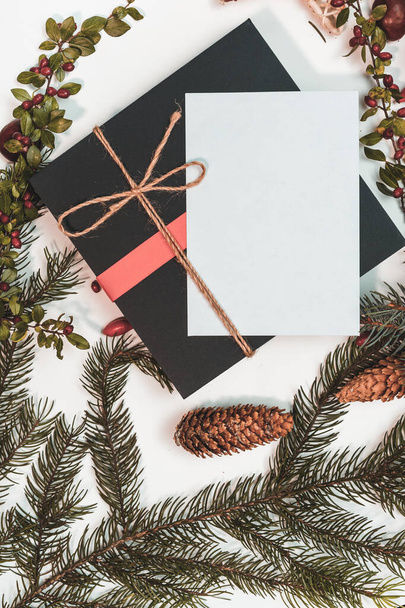 Christmas mockup for postcard with dry fruits, craft paper, gift box, handmade christmas toys - 写真・画像
