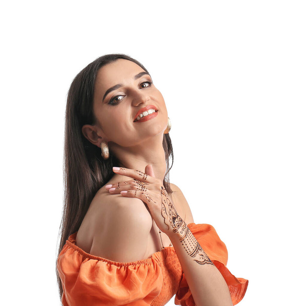 Beautiful Indian woman with henna tattoo on white background - Foto, imagen