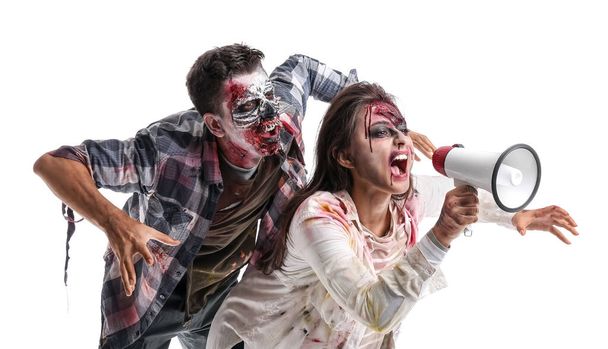 Zombies aterradores con megáfono sobre fondo blanco - Foto, imagen