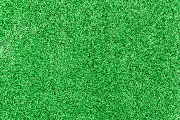 Nowa zielona sztuczna nawierzchnia trawiasta tekstura i bezszwowe tło - Zdjęcie, obraz