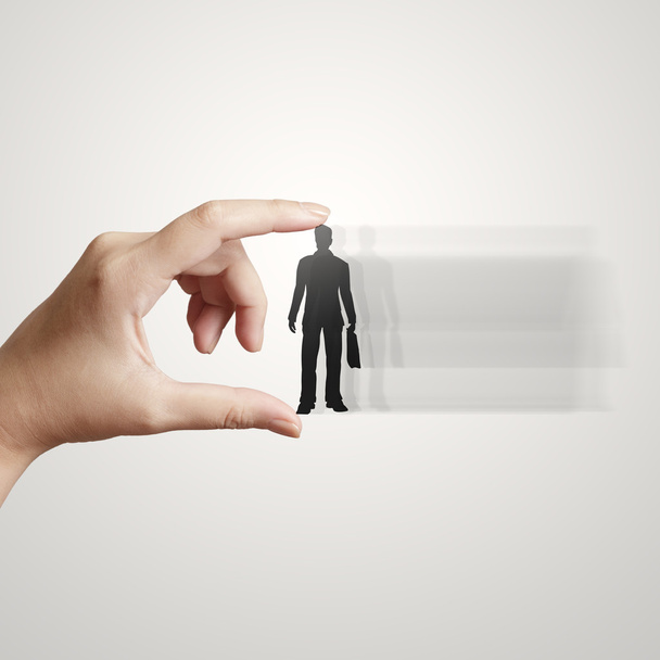 zakenman kiezen mensen pictogram van een hand als menselijke hulpbronnen concept - Foto, afbeelding