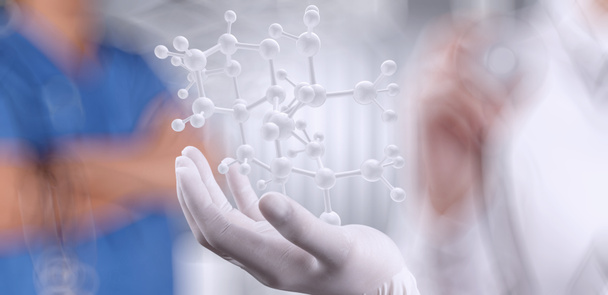 scientifique médecin main tient la structure moléculaire virtuelle dans le l
 - Photo, image
