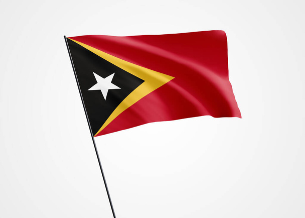 Timor Leste bandera ondeando alto en el fondo blanco aislado. 20 de mayo Día de la Independencia de Timor Oriental Recolección mundial de banderas nacionales Recolección mundial de banderas - Foto, imagen